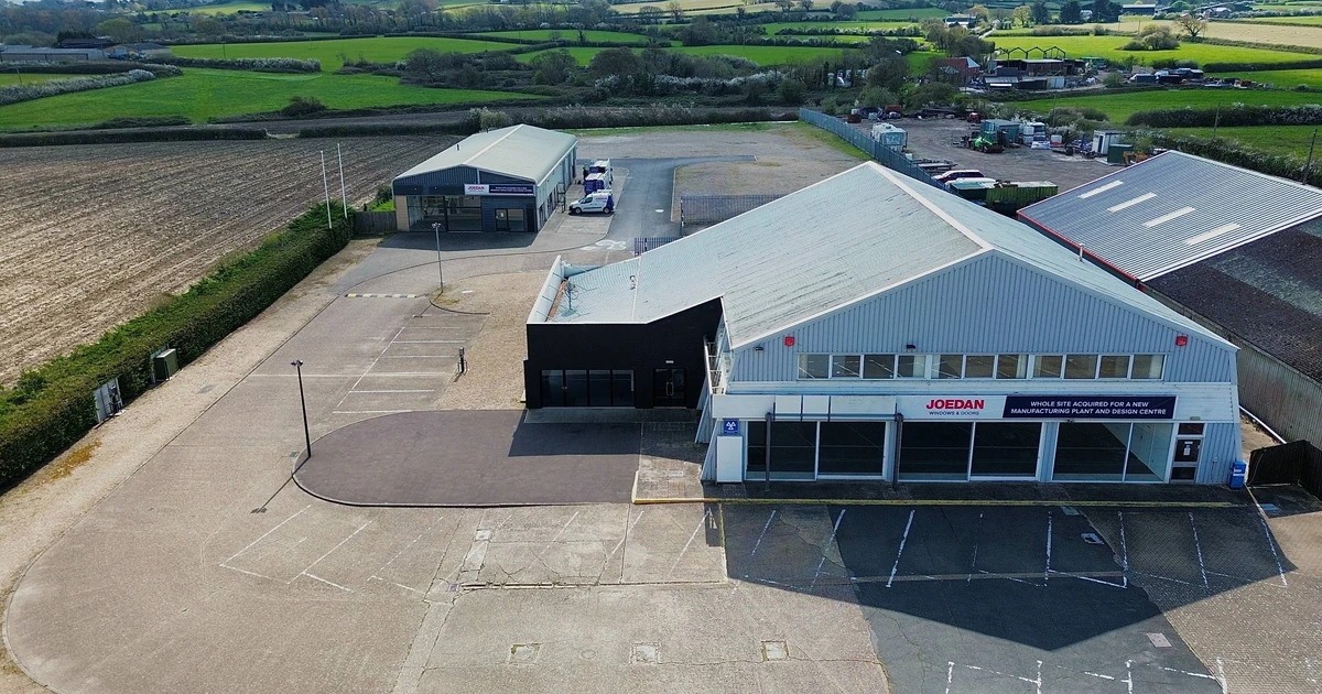 Aerial view of Joedan's Isle of Wight location showing industrial buildings and surrounding open land for manufacturing expansion